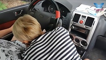 A Woman Performs Oral Sex On A Man In A Vehicle